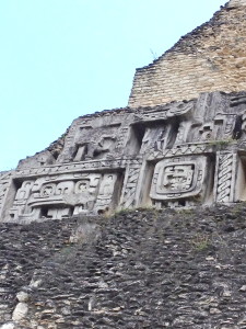 A Frieze carved into the side of a pyramid at Xunantinich, Belize.